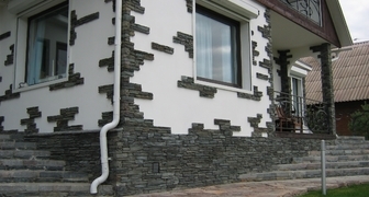 Применение декоративной бетонной плитки в облицовке фасада